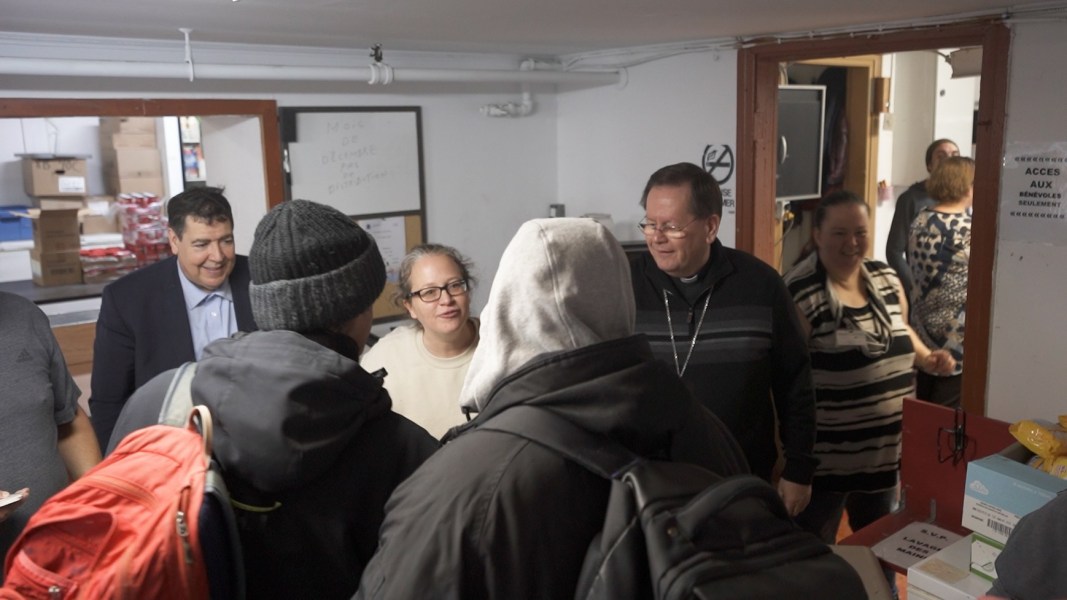 Cardinal - don de nourriture - crédit ECDQ - 2